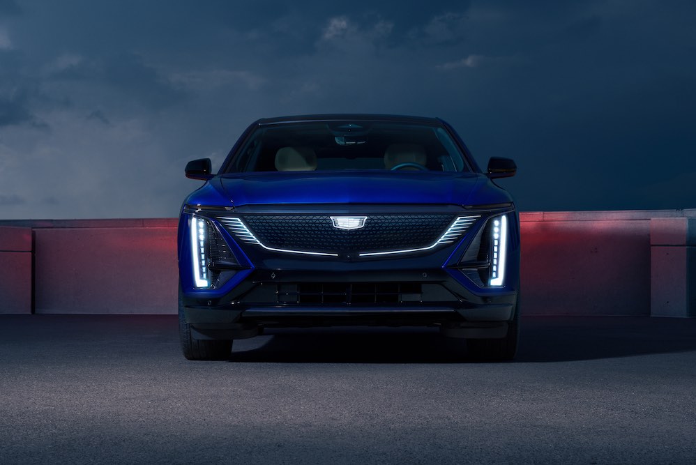 Front view of the 202 Cadillac LYRIQ V with the front grille illuminated.